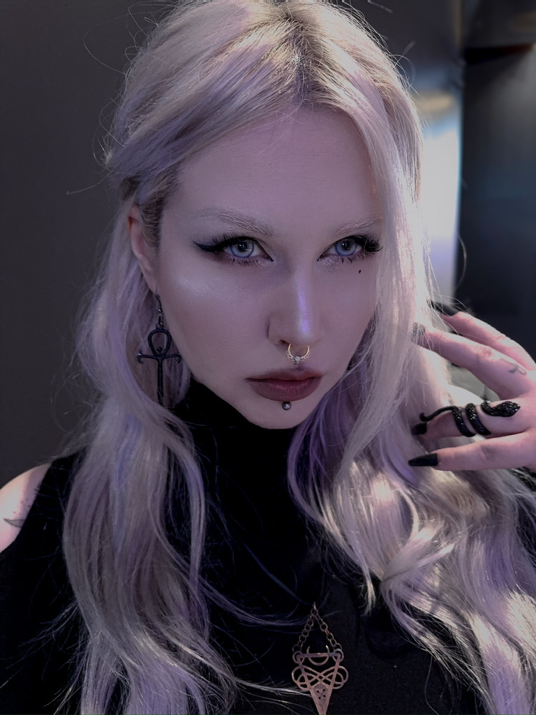 Portrait of Anomalyda, silver-white hair in violet light